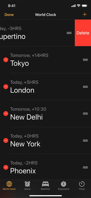 A screenshot of the World Clock view of the Clock app. The Edit button has been tapped and the Delete button for the first item has been revealed.