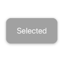 An image of a button. Because the button is selected, it appears very close the surface of the background, and retains its original size, but displays a dark background and white content.