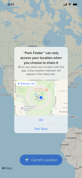 A screenshot of the alert displayed by the location button that appears on top of a background image showing a partial map of the Western Hemisphere. The alert reads ’Park Finder can only access your location when you choose to share it. When you share your location with this app, a blue location indicator will appear in the status bar.’ Below this text the alert displays a small image of the map, zoomed in to show part of Cupertino. Below the map are two buttons; from the top the titles are OK and Not Now.
