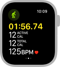 Screenshot of the middle Workout screen for an Indoor Cycle workout. Four lines of data are visible. From the top, the screen shows the elapsed time, which is one hour, fifty-six minutes, and seventy-four seconds, twelve active calories, twelve total calories, and a heart rate of one hundred twenty-five beats per minute.