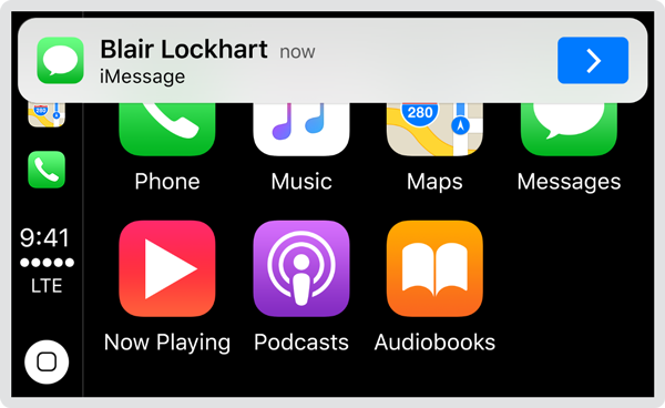 Screenshot of the CarPlay home screen. A new message notification is displayed at the top of the screen, and includes a button for navigating to the message.