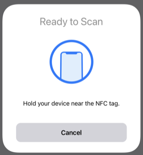Image of a scanning sheet near the bottom edge of the device screen, which displays the text Ready to Scan and offers a Cancel button.